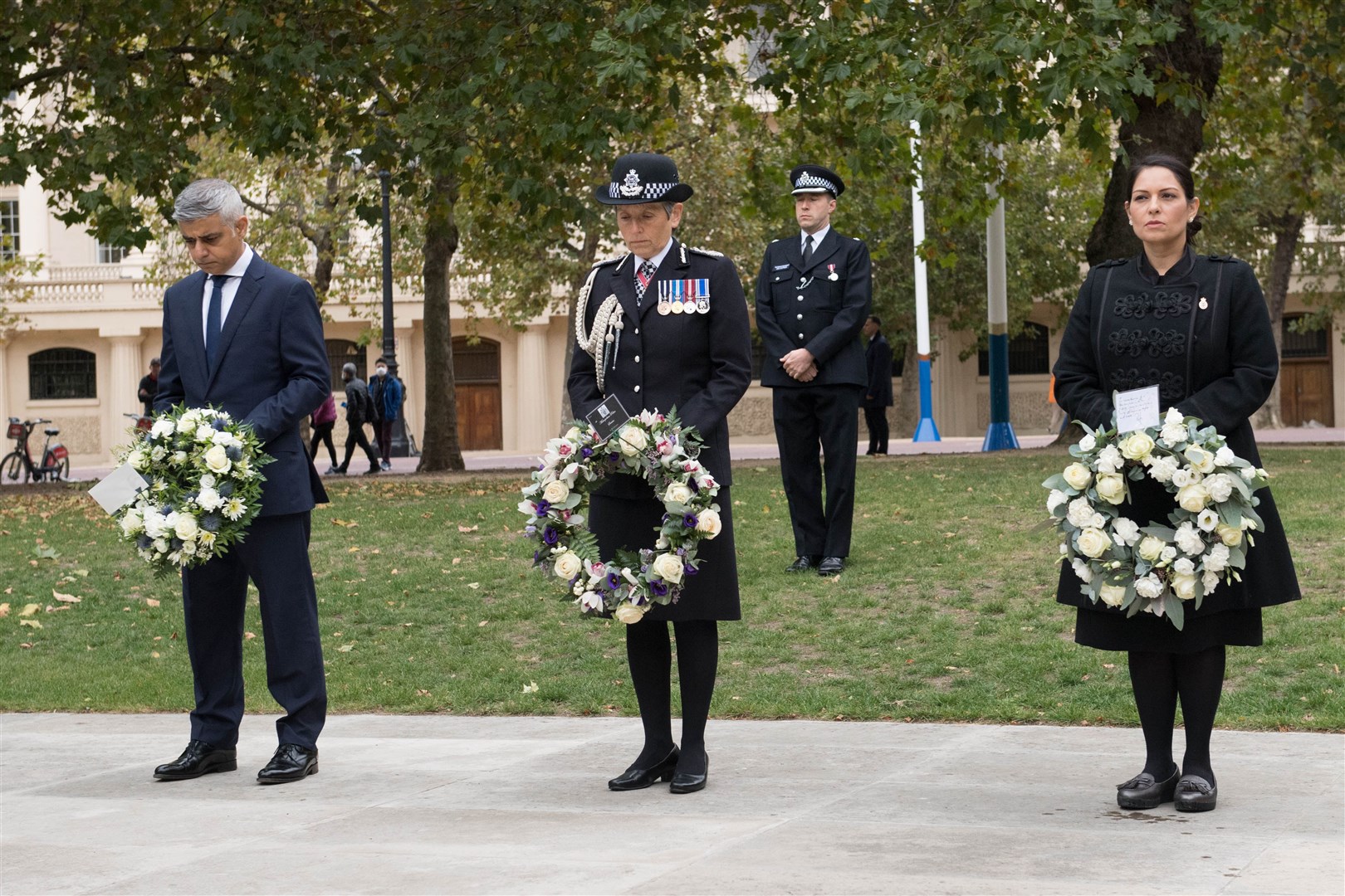 London Mayor Sadiq Khan, Metropolitan Police Commissioner Dame Cressida Dick and Home Secretary Priti Patel at the National Police Memorial in London (Stefan Rousseau/PA)