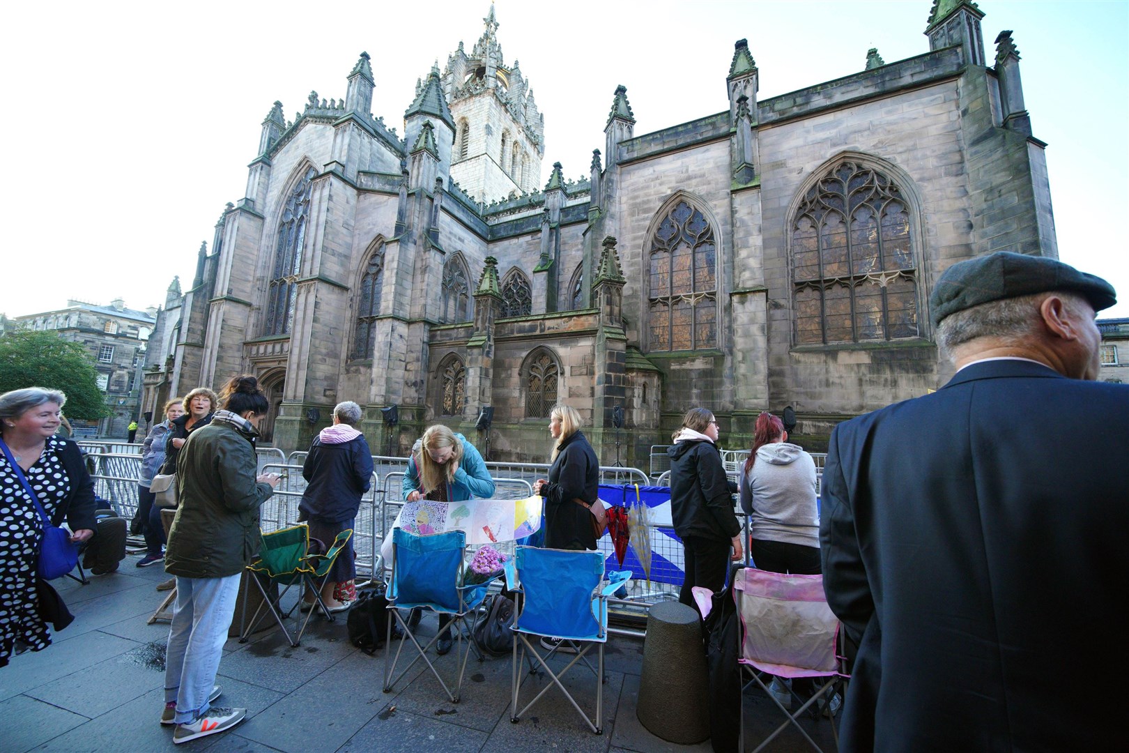 People gathered outside St Giles’ Cathedral in Edinburgh ahead of Monday’s service (Peter Byrne/PA)