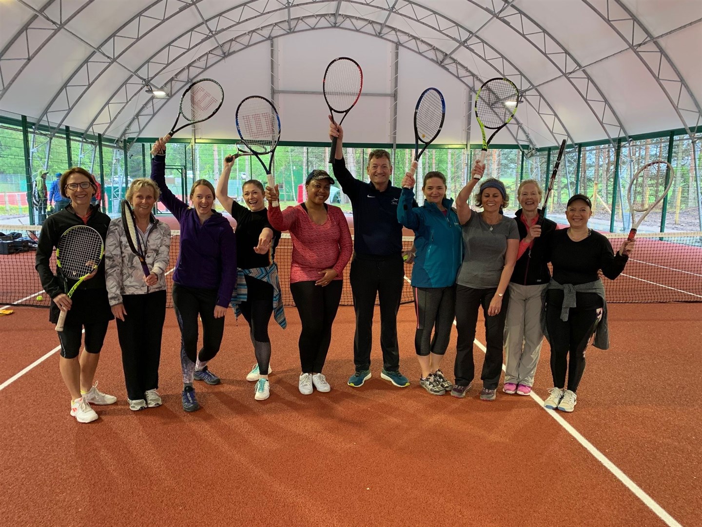 Some of the women who took part in the morning coaching session with coach Matt Hulbert (centre).
