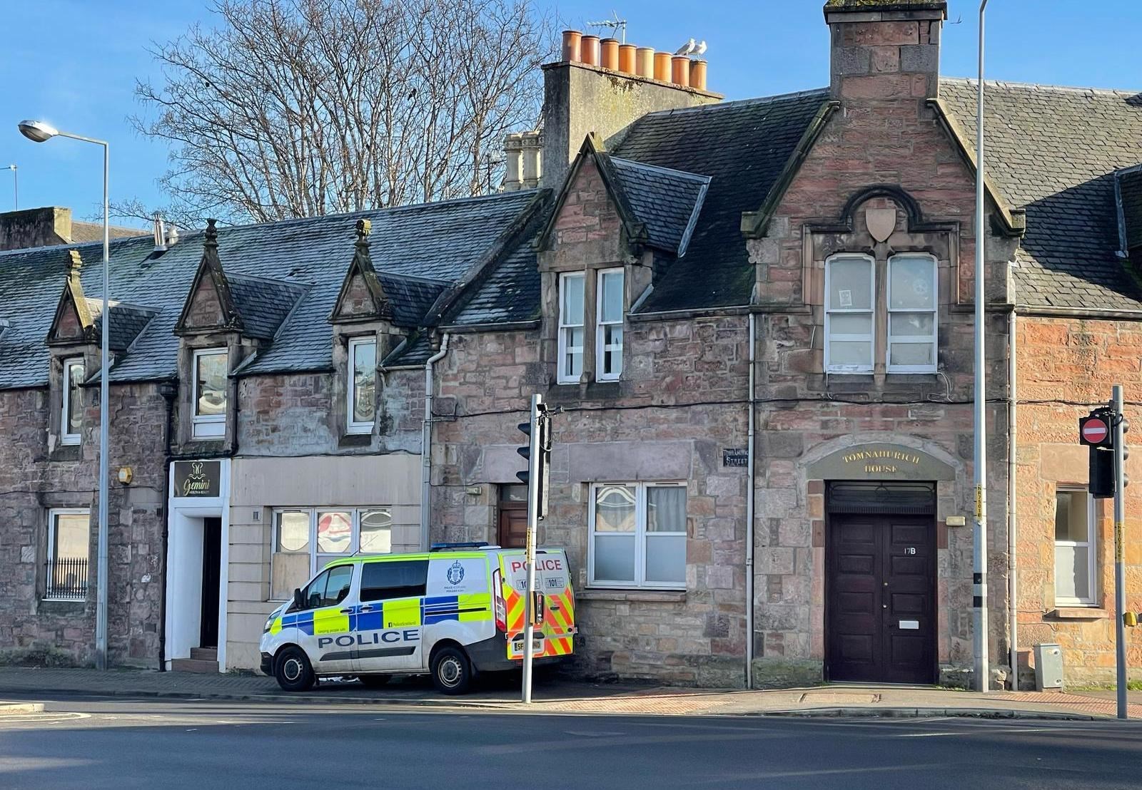 Scene of crime officer at work on Tomnahurich Street after a 50-year-old man was stabbed.