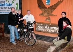 Brian Anderson gets ready for his journey with the help of Mr Thaxton and Loch Garten staff