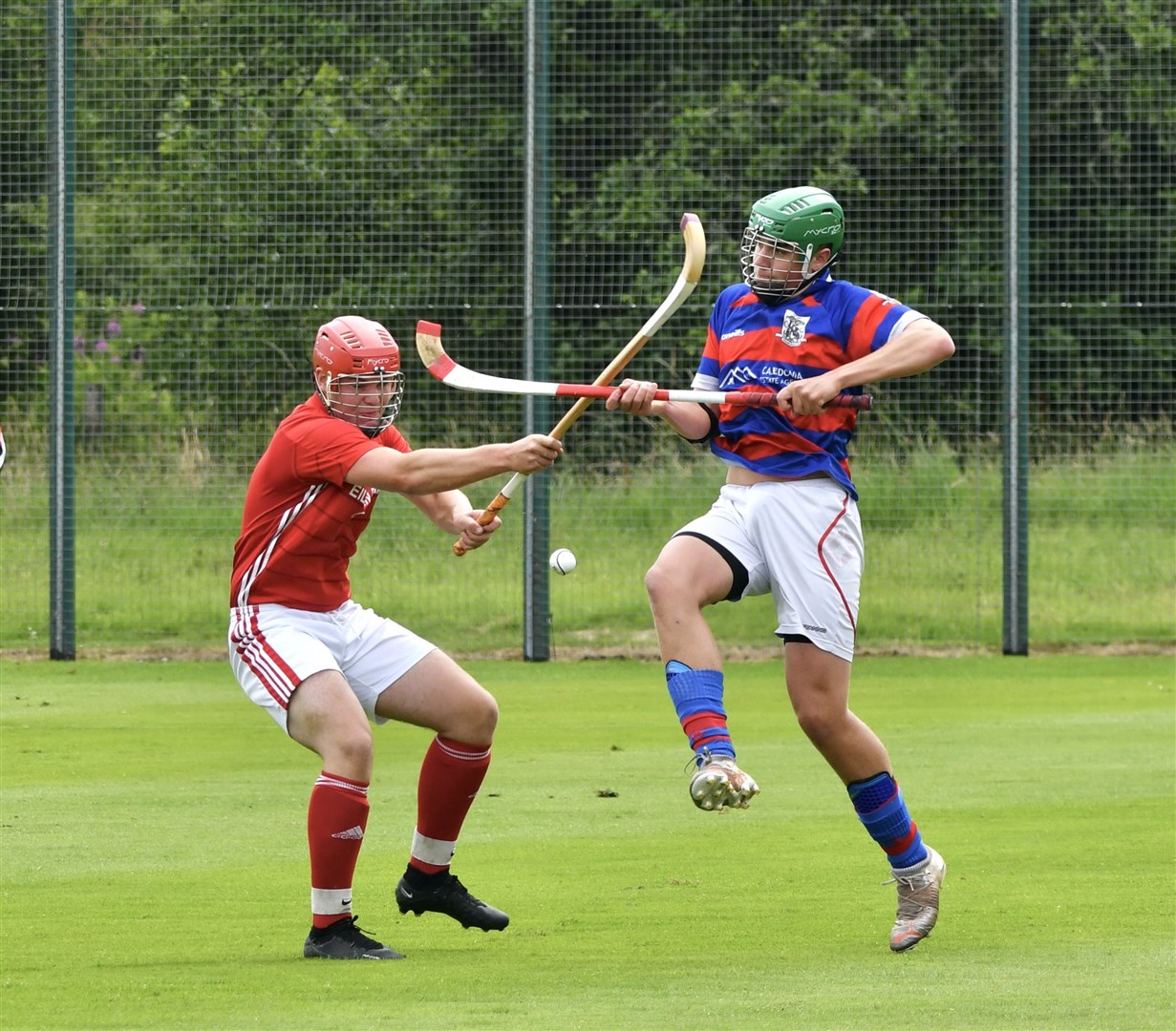 Calum MacKintosh (right in his trademark green helmet) had enjoyed an outstanding breakthrough season with the Kingussie first team. His sudden death aged just 20 came as a terrible blow.