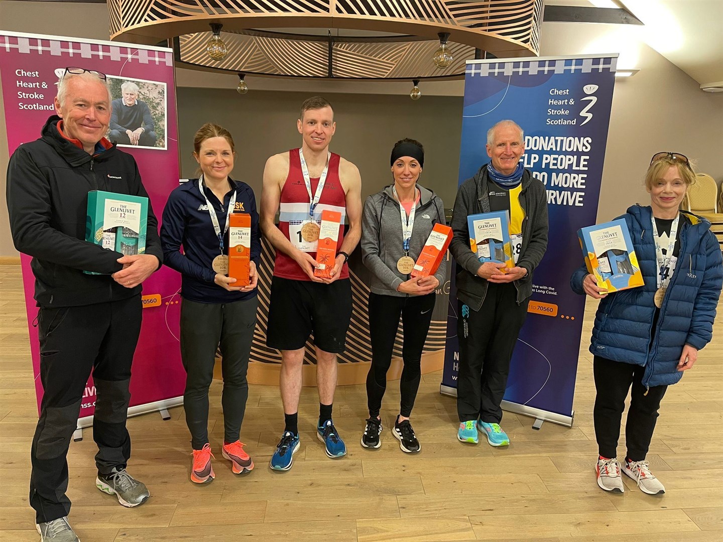Robert Keenan (male veteran category winner), Claire Howie (female super veteran winner), Isaac Mann (male senior category winner), Amy Hudson (female senior winner), George McPherson (male vintage winner) and Mary Mowat (female vintage winner).
