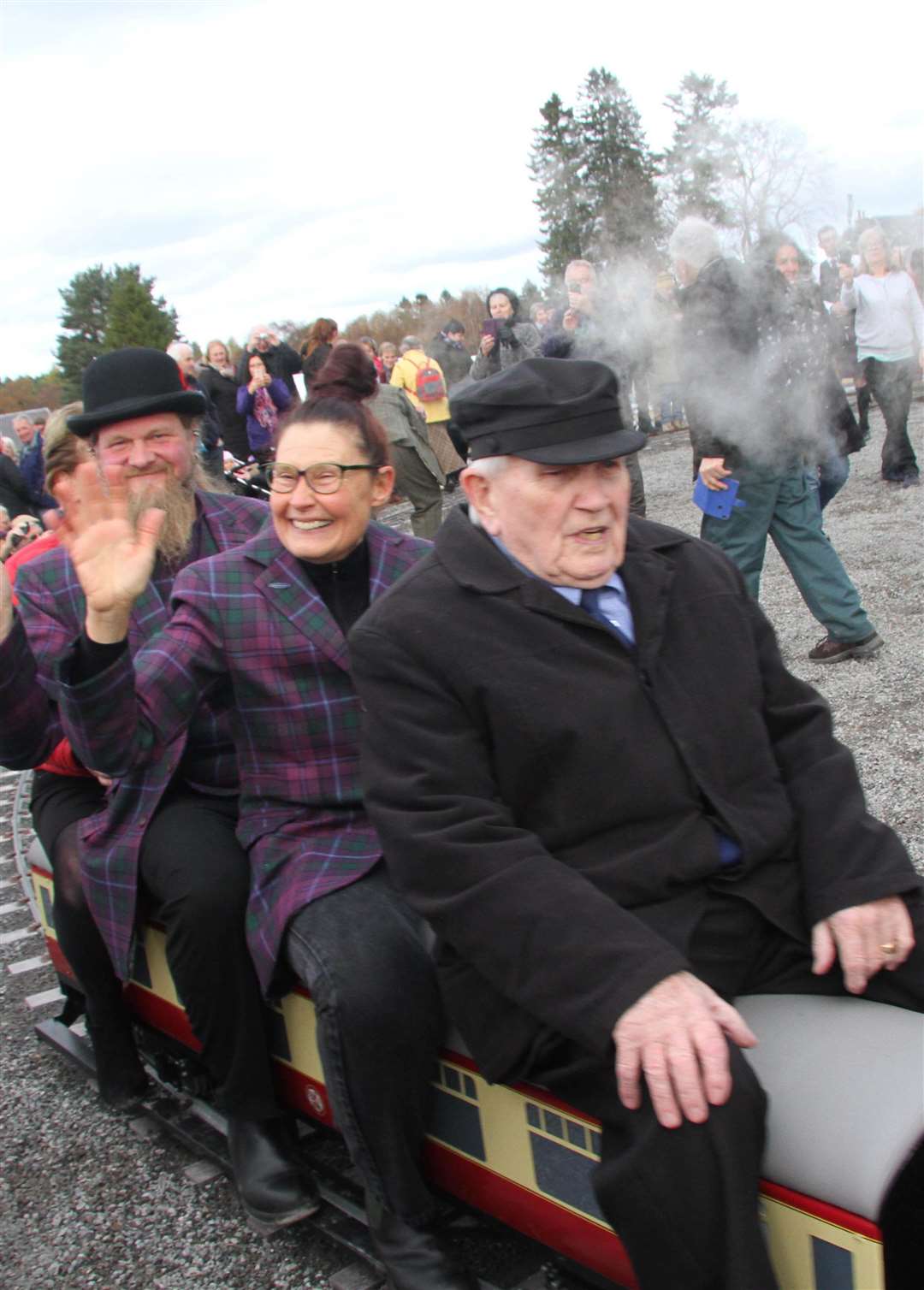 Happier times... owner Karen Blessington and partner Dave Garman riding the attraction's mini railway at the opening of Grantown East.