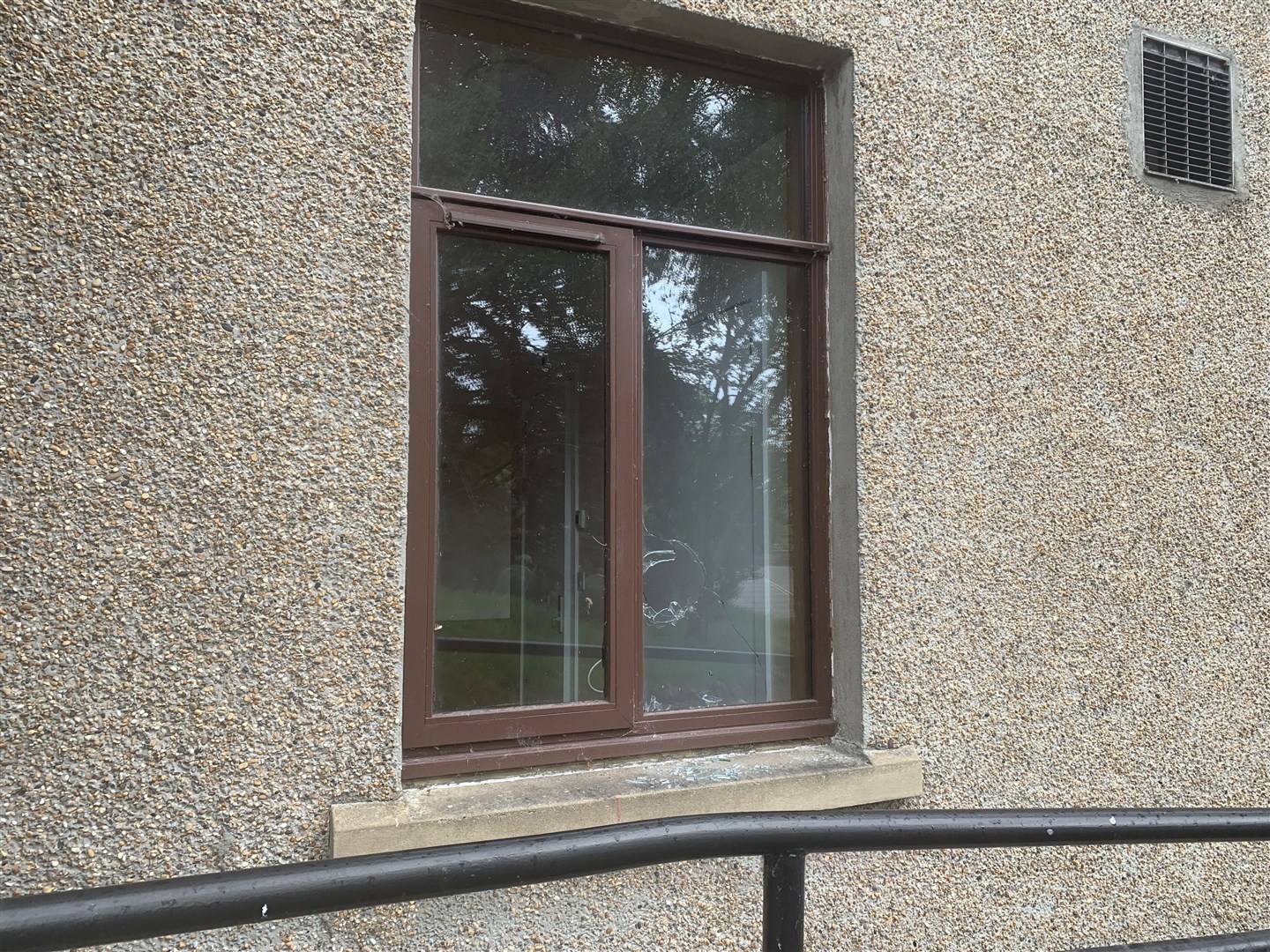 Smashed pane at former hospital