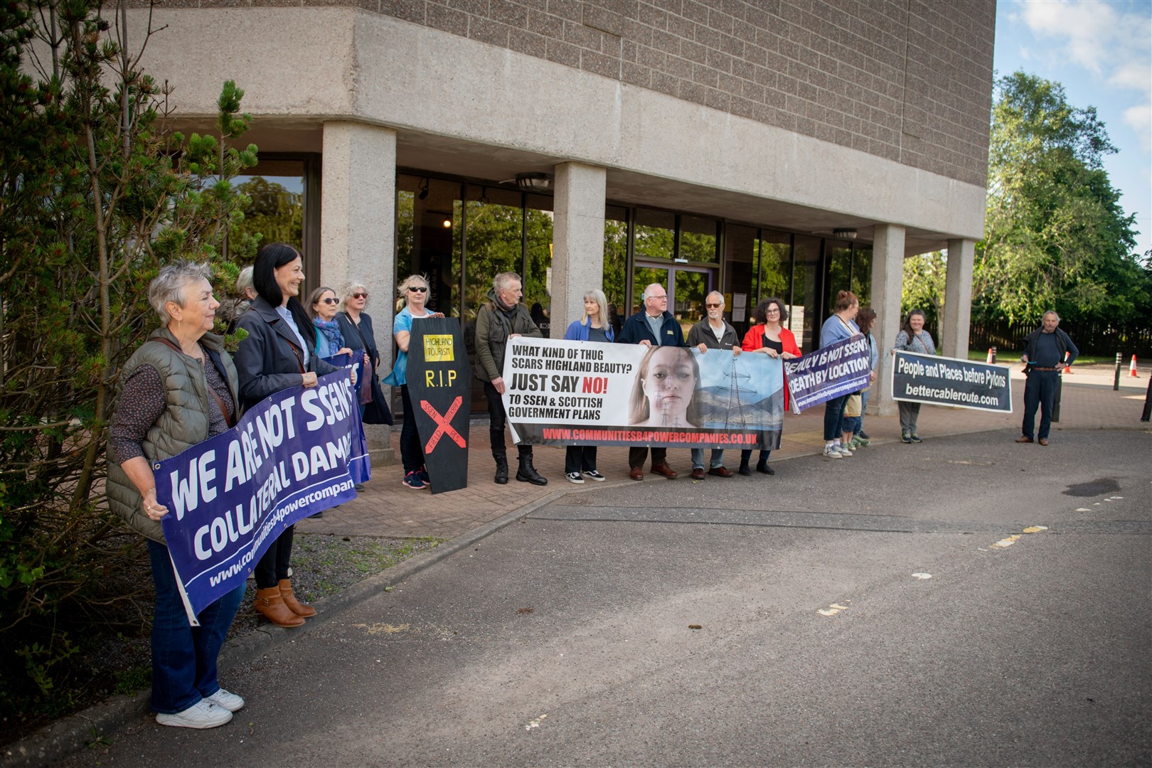 The protestors make their feelings known before the meeting of the full council in Inverness on Thursday. Picture: Callum Mackay.