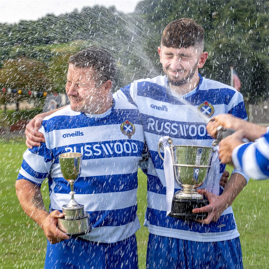 Glen MacKintosh (left) will take over from last season’s captain Ritchie Irvine (right) for 2024. The pair are pictured enjoying the celebrations after winning the 100th Sutherland Cup final against Skye in September. MacKintosh received the man of the match award in the match played at Blairbeg.
