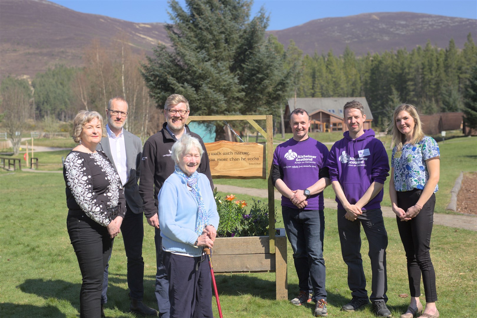 Leading the way: from left, Geraldine Ditta and Tom Ingrey-Counter (National Lottery Heritage Fund); Grant Moir (Cairngorms National Park Authority); Christine Macdonald (centre user); Kenny Wright, Andy Miller and Gillian Councill (Alzheimer Scotland). Picture: James Lee