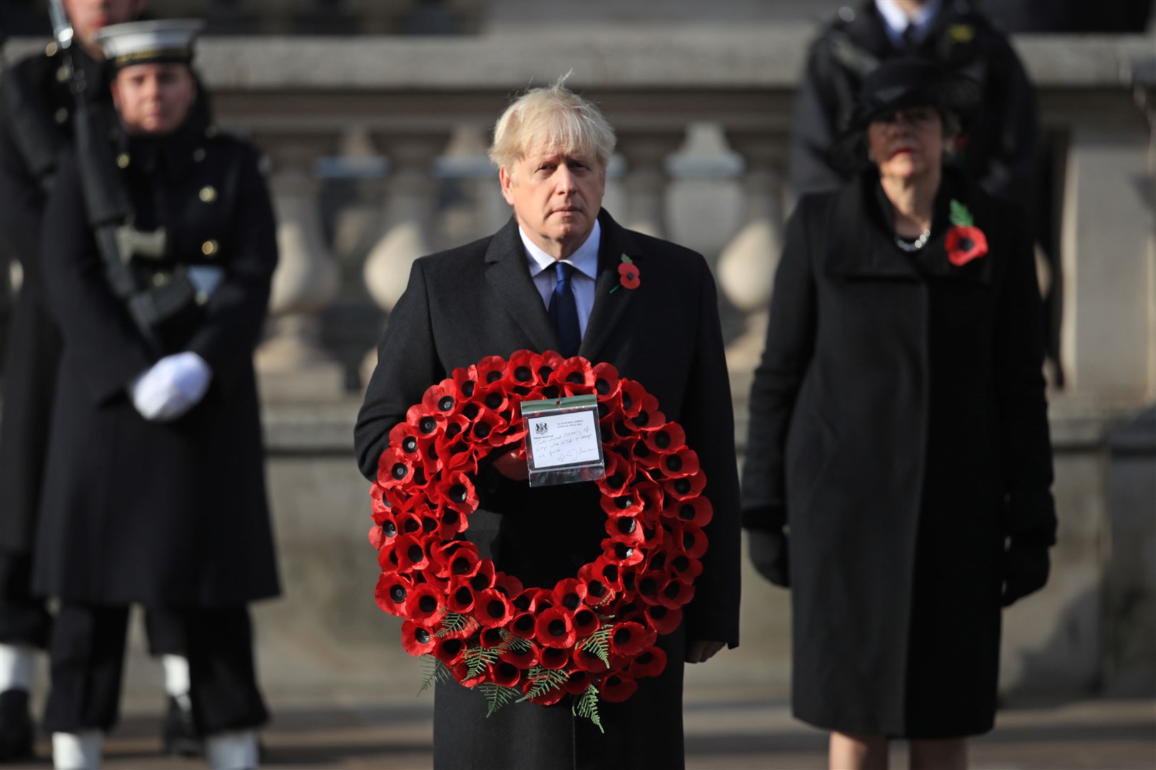 Prime Minister Boris Johnson paid tribute to those lost in conflict, saying ahead of the Whitehall service: ‘In times of trial, our tributes matter even more.’ (Aaron Chown/PA)