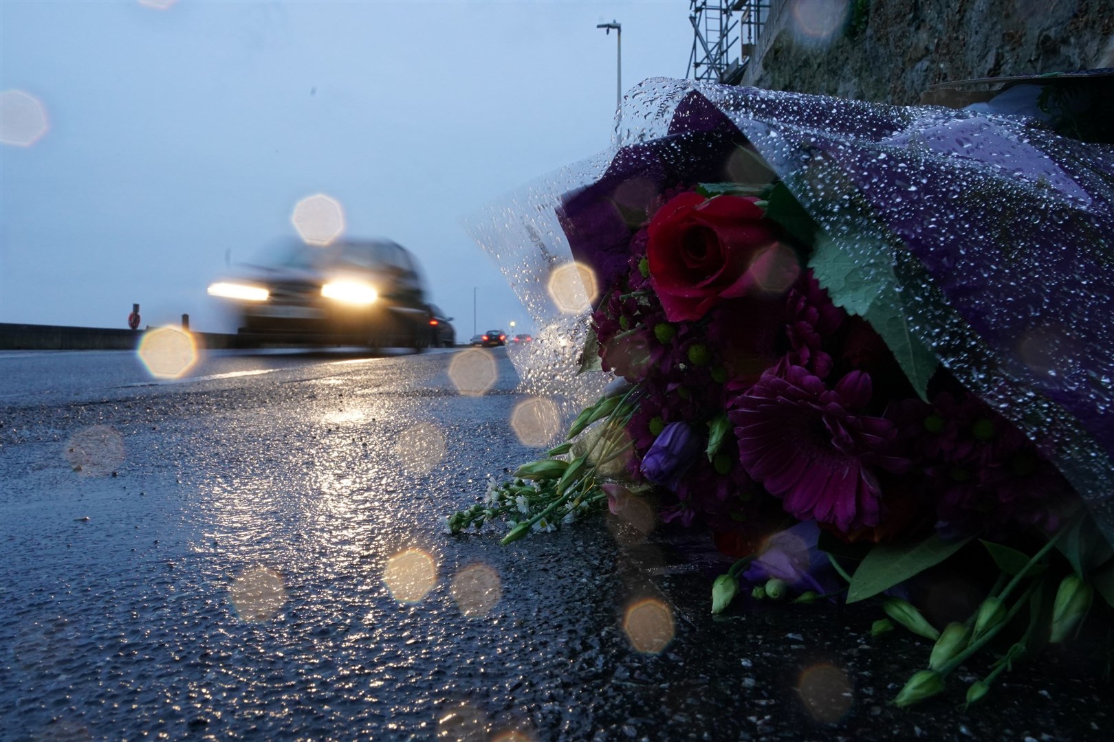 Flowers left at the scene (Gareth Fuller/PA)