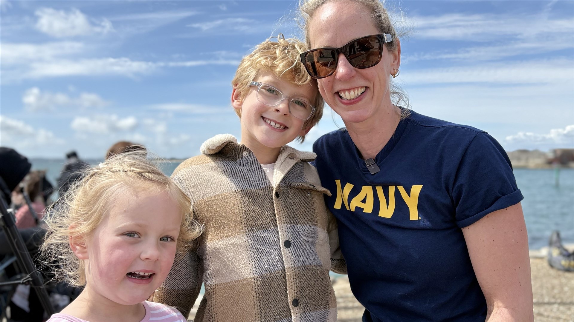 Gemma McConnell with children Lachlan, seven, and Chloe, four, as they wait to wave off Surgeon Commander David McConnell (Ben Mitchell/PA)