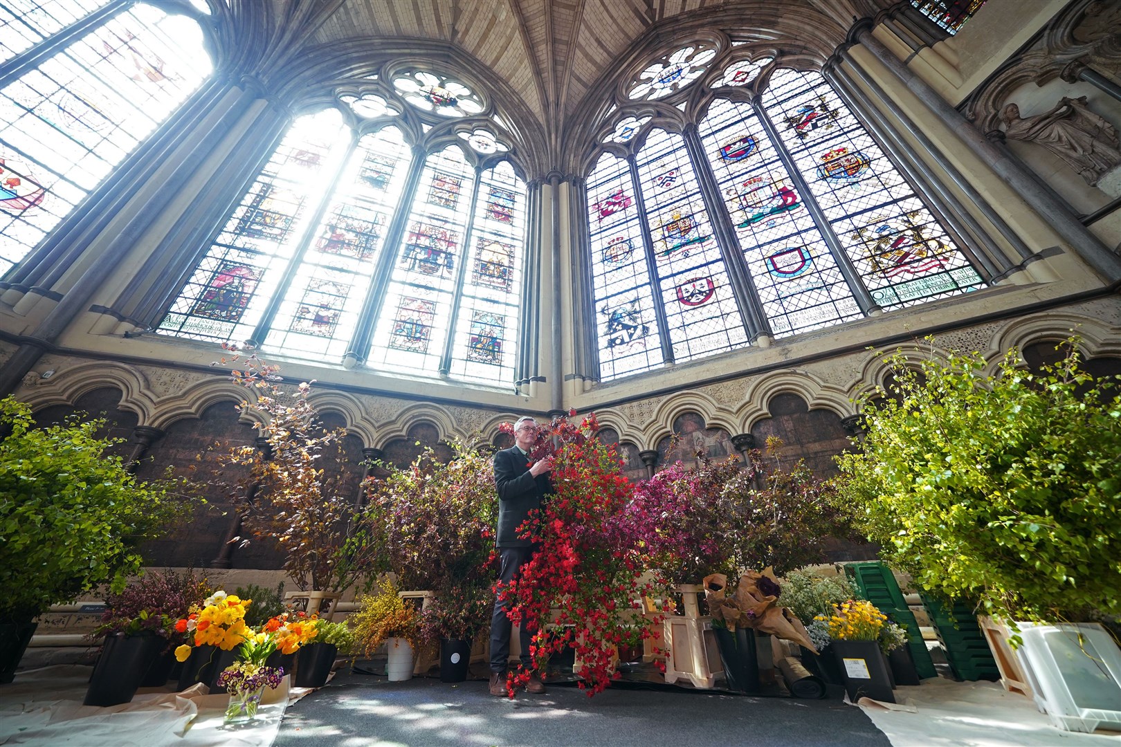 Florist Shane Connolly, who arranged the flowers within Westminster Abbey, amongst the coronation service flowers (Yui Mok/PA)