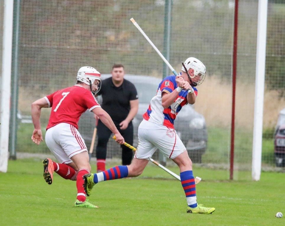 “an elegant weapon, graceful to wield, and of delightful capacity for hacking an opponent's head, or elevating his knee-cap (picture Aidan Woods)