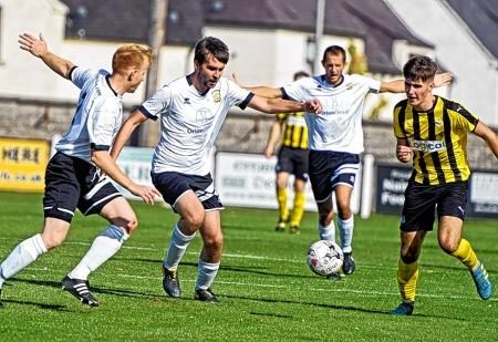 Ross Mackillop (second from left) says Clach must improve.