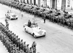 Prime minister Winston Churchill inspects the eighth army infantry and tanks at the victory parade in Tripoli