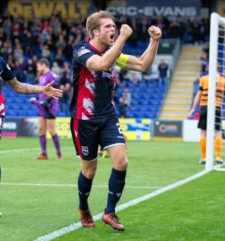 Ross County club captain Marcus Fraser celebrates.