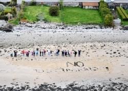 Local children spelled out the words No Incinerator on the sand at Saltburn.