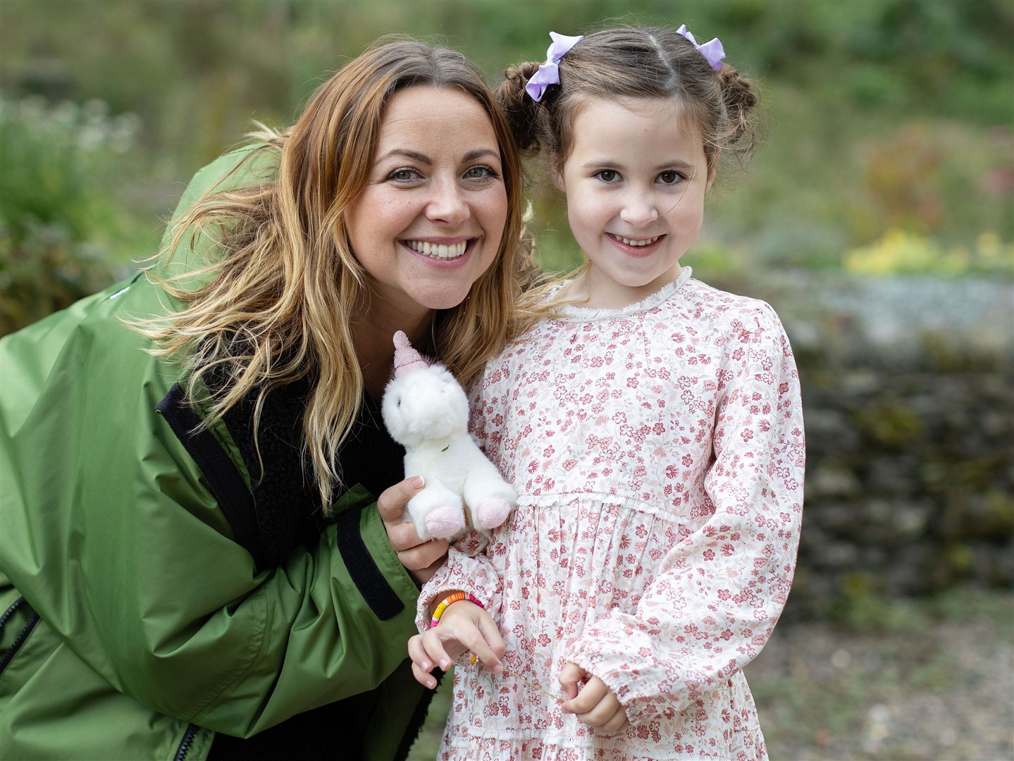 Charlotte Church with six-year-old Harper, the youngest member of the choir (Anna Gordon/PA)