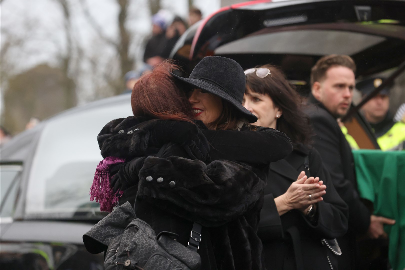 Victoria Mary Clarke (right), wife of Shane MacGowan, arrives for the funeral (Niall Carson/PA)