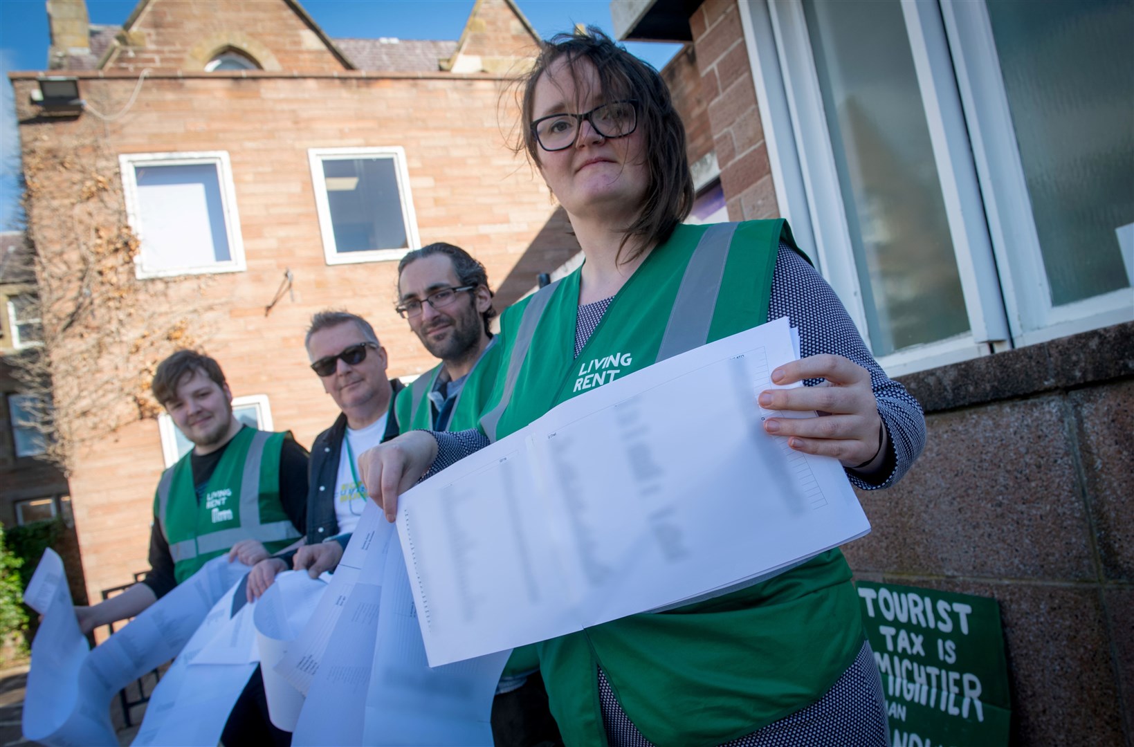 Handing in the 800-name petition are Feargus Murray, Louis McIntosh, Daniel Reat and Stephanie Mann. Picture: Callum Mackay.