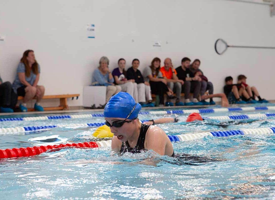 Poolside action from one of the early swim heats.