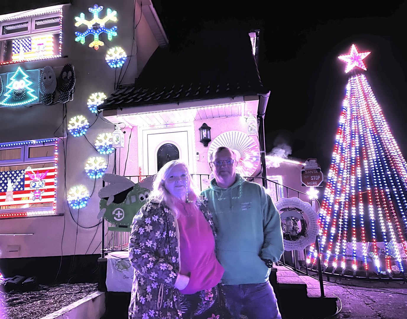 Ian and Ann Cooper transform their home in Bristol into a Christmas light show for the month of December (Ian Cooper/PA)