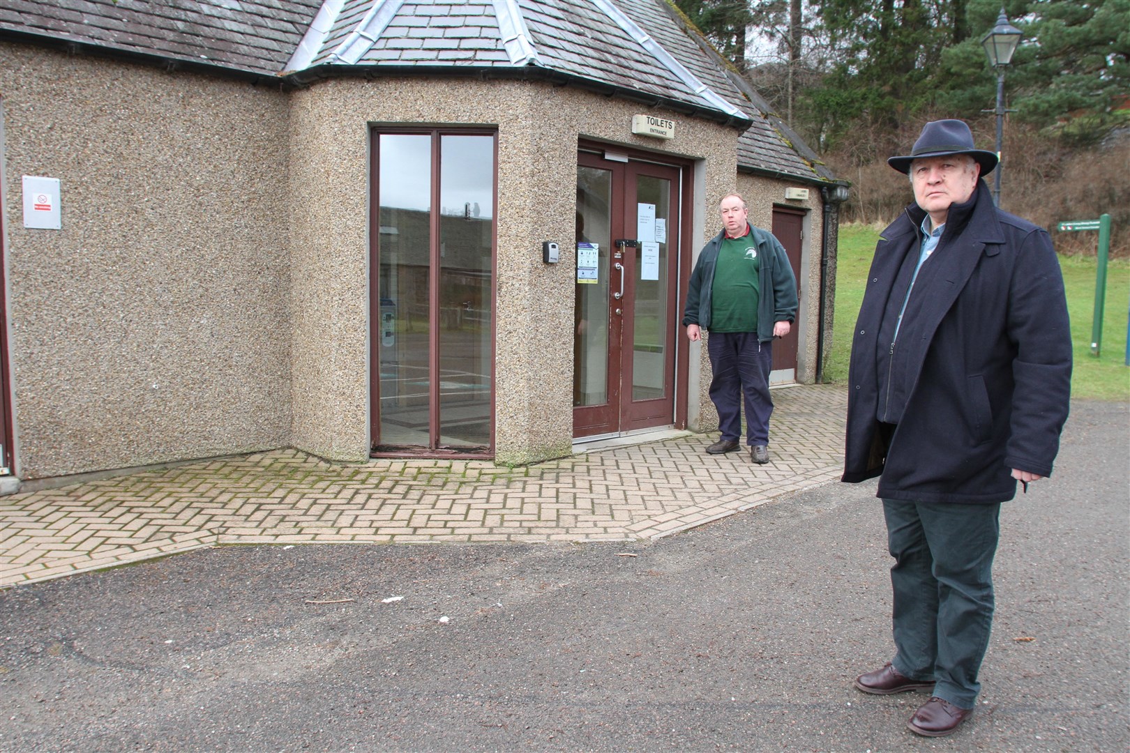 Kingussie community council chairman Ruaridh Ormiston (left) and Councillor Bill Lobban before inspecting damage at the Ardvonie public toilets last year.