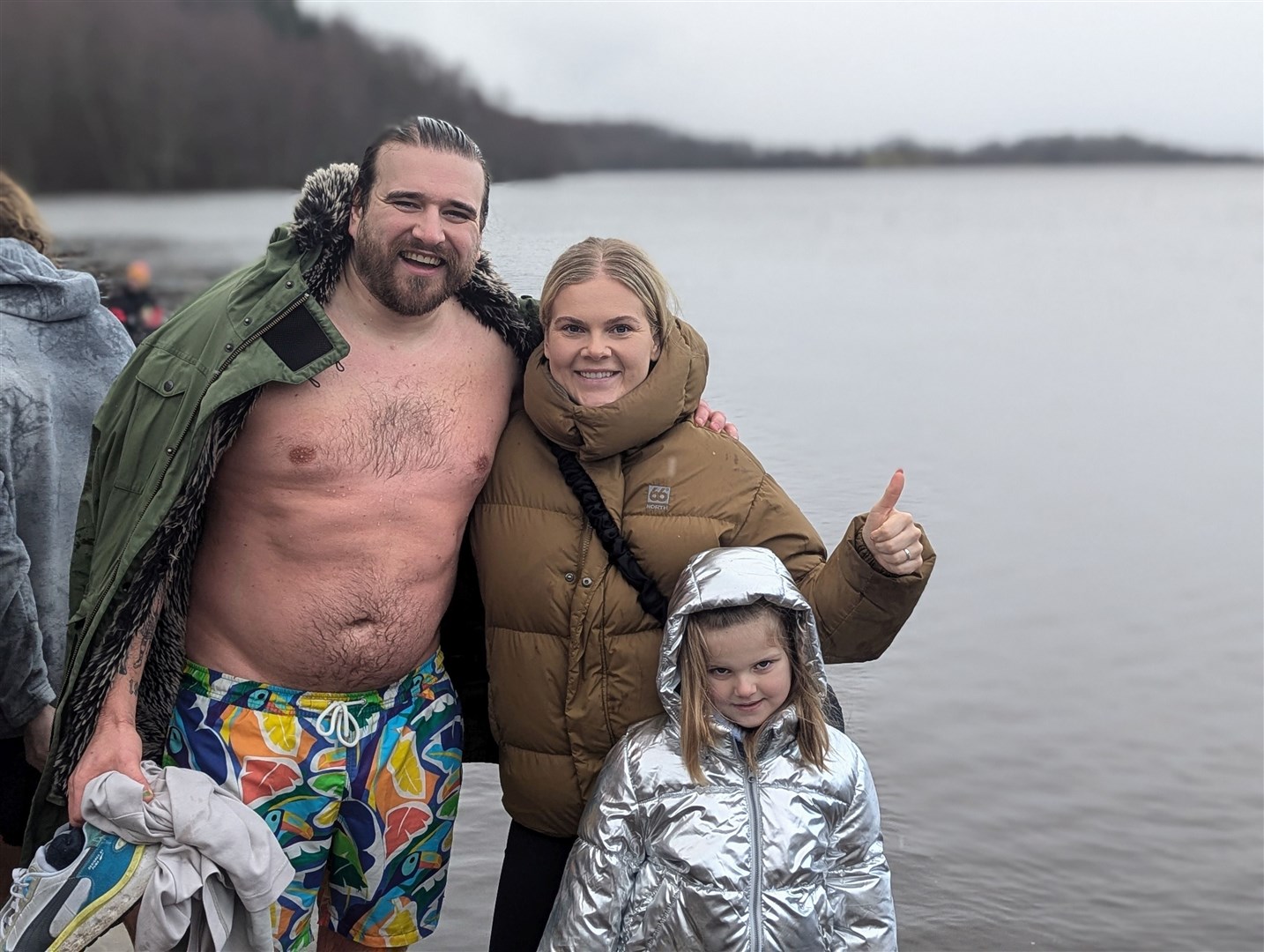 WELL DONE! Ruridh Wilson gets hugs and congrats from wife Elisa and daughter Gigja (5)