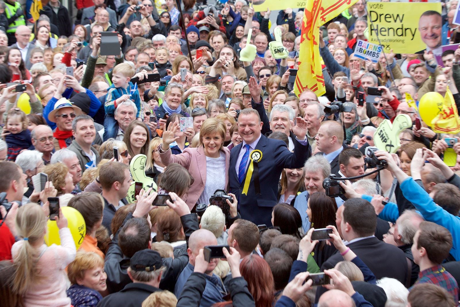 Nicola Sturgeon is met with a huge crowd as she arrives in the Highland capital. Pictured is Inverness candidate, Drew Hendry...Picture: Paul Campbell .Tel: 07790 299920.