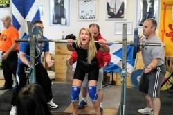 Melissa Wall, from Aviemore, uses everything she’s got to complete her squat at the Scottish Masters Powerlifting Championships. Picture by Grant Hendry-Horne.