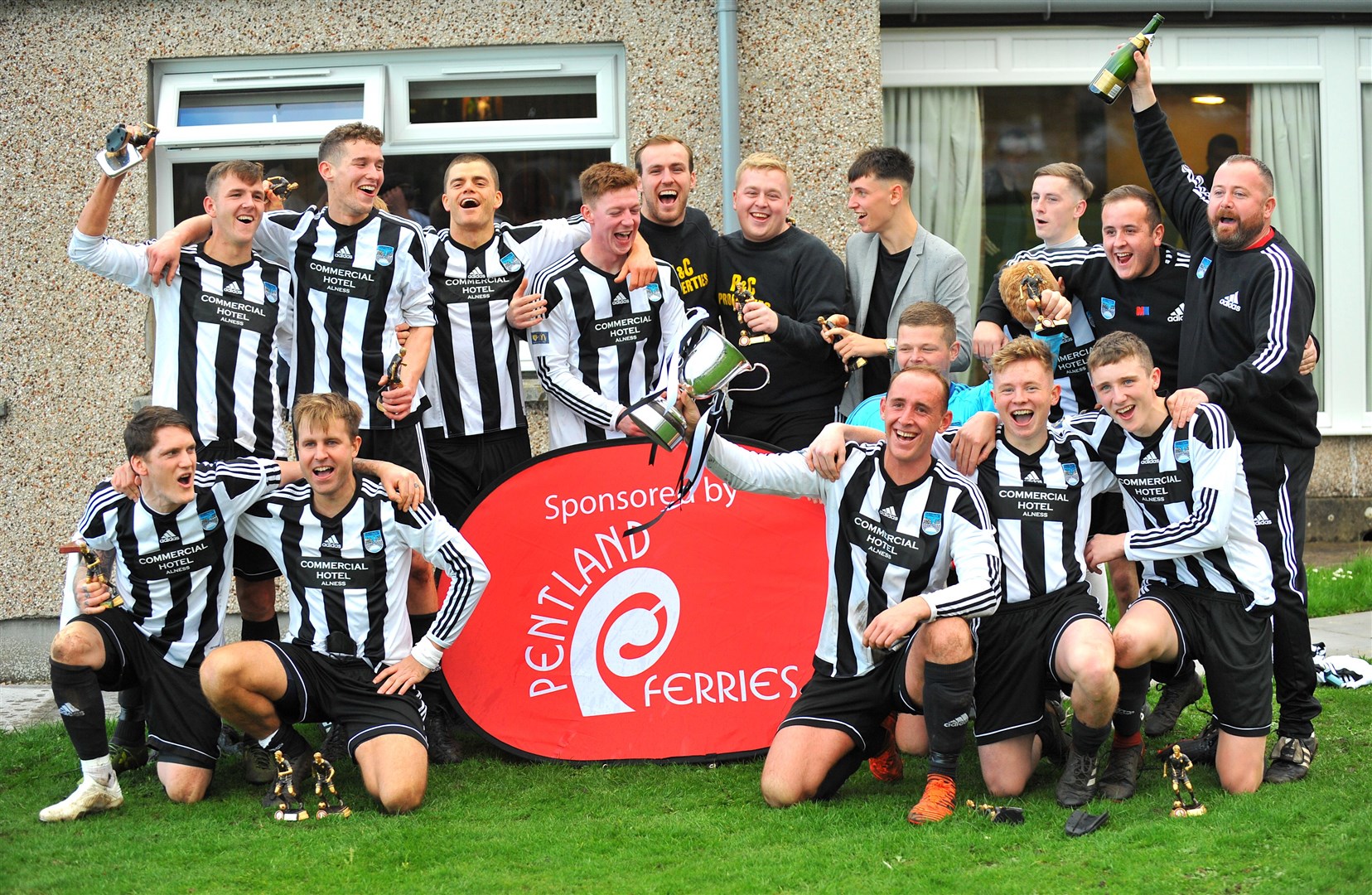 Alness United celebrate winning the Football Times Cup. Picture: Graeme Webster