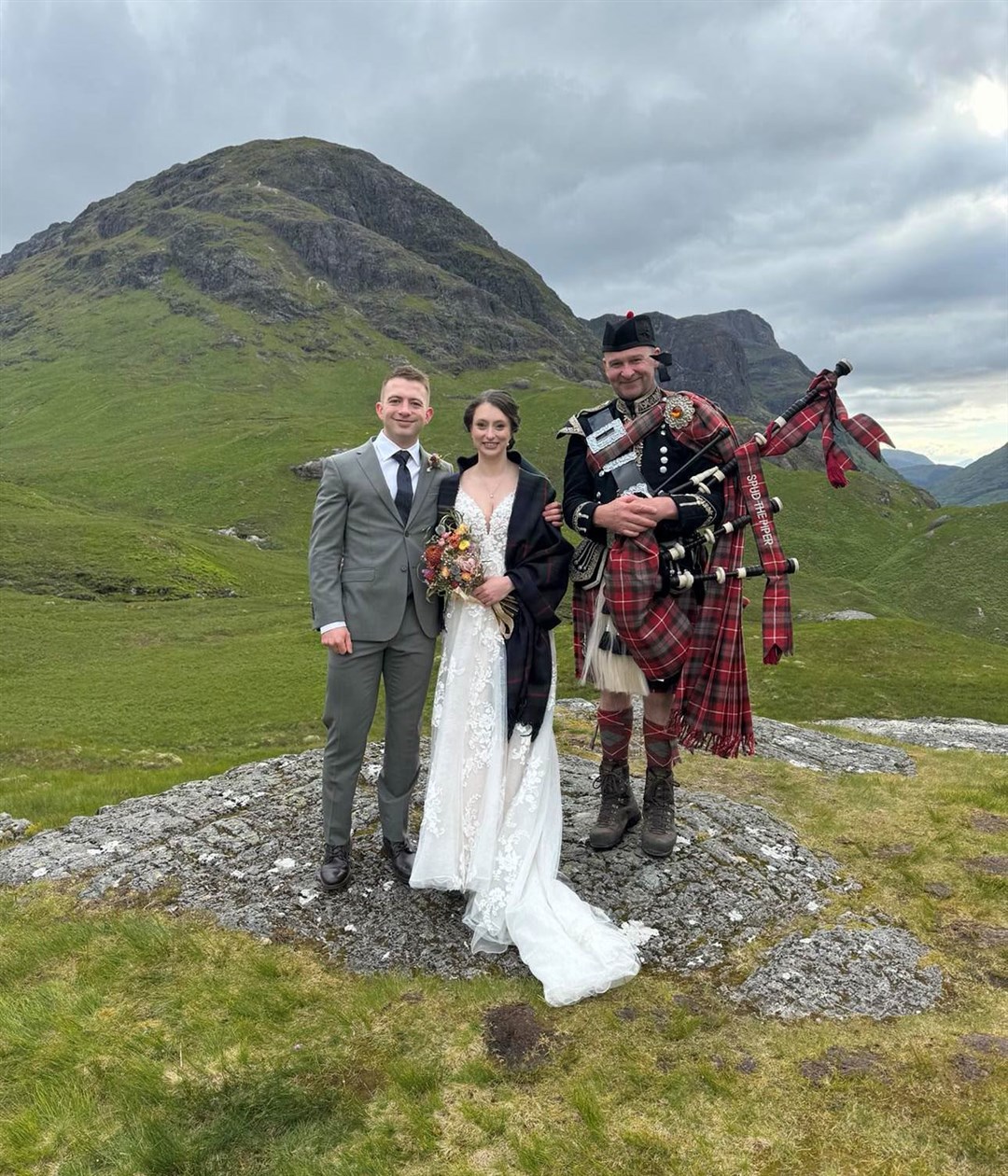 Spud with the happy couple last summer.