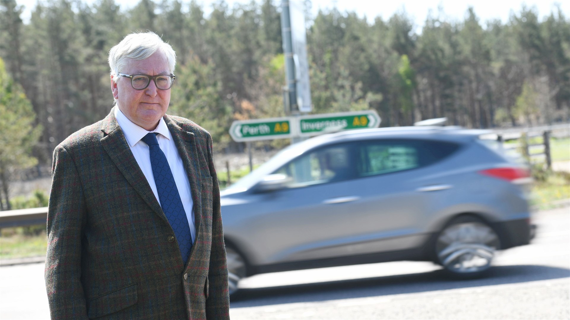 Fergus Ewing A9 at the Carrbridge turn off. Picture: Callum Mackay..