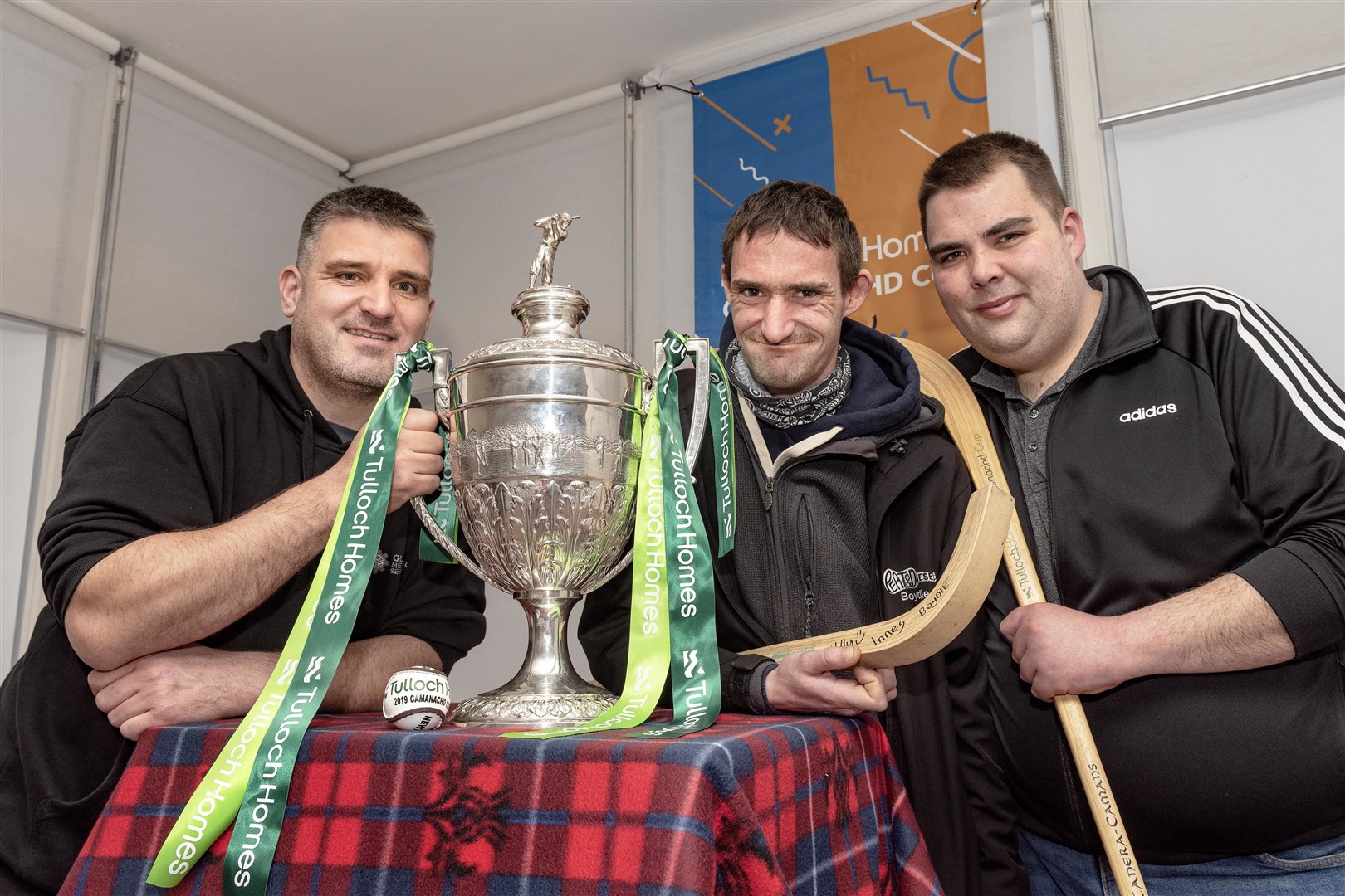 Tulloch Homes Camanachd Cup Draw made by Peat & Diesel ahead of their sell-out concert at Strathpeffer Pavillion: Innes (Scott), Boydie (MacLeod) and Uilly (MacLeod).