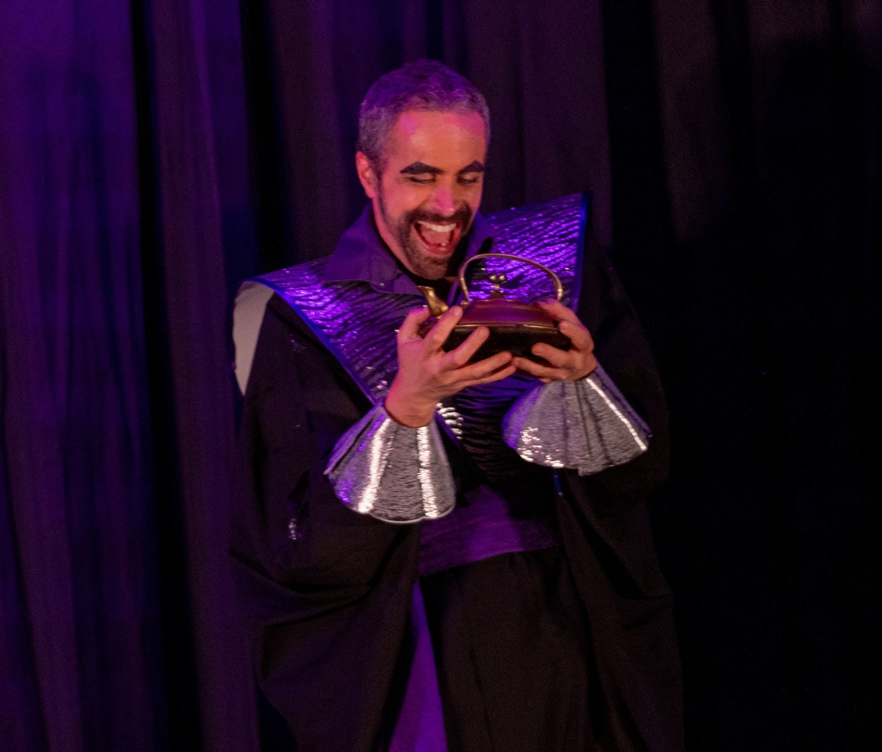 BOO HISS! The evil Abanazer was devilishly portrayed by Michael Dawson (Aidan Woods)
