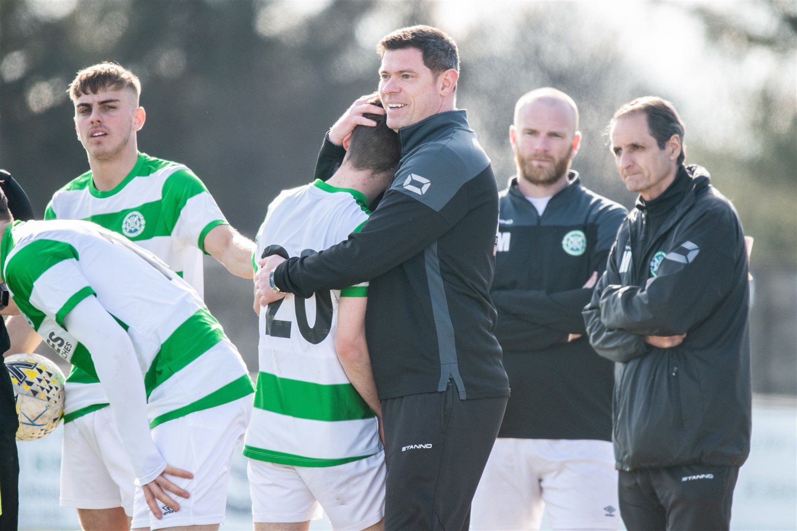 Buckie Thistle manager Graeme Stewart hugs Marcus Goodall as he makes a second half sub. Picture: Daniel Forsyth.