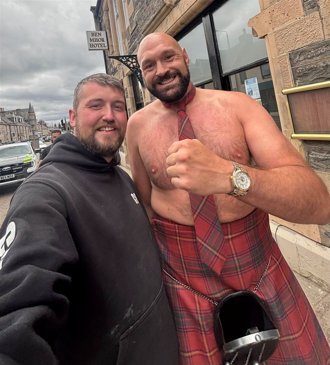 Cromdale FC manager Stuart Dunbar with "potential new signing" Tyson Fury during his visit to Grantown-on-Spey.