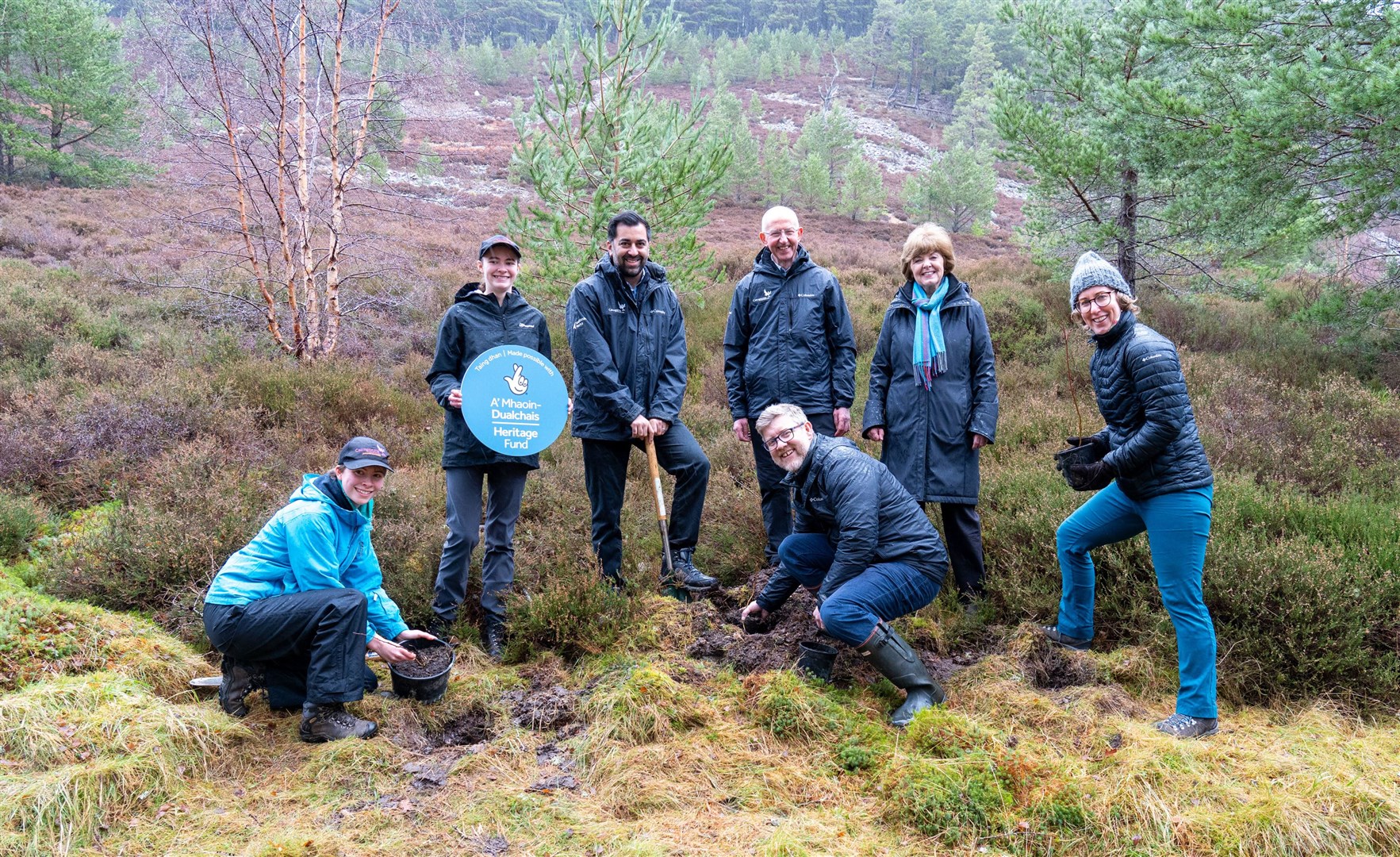 At the announcement of the huge windfall for the national park are Katherine Parfitt (junior ranger) Anna Parfitt (junior ranger), First Minister Humza Yousaf, Sandy Bremner, (CNPA convener), Grant Moir, (CNPA CEO), Ray Macfarlane (Scotland Committee Chair and a trustee and Deputy Chair of The National Lottery Heritage Fund) and Lorna Slater - Minister for Green Skills, Circular Economy and Biodiversity.