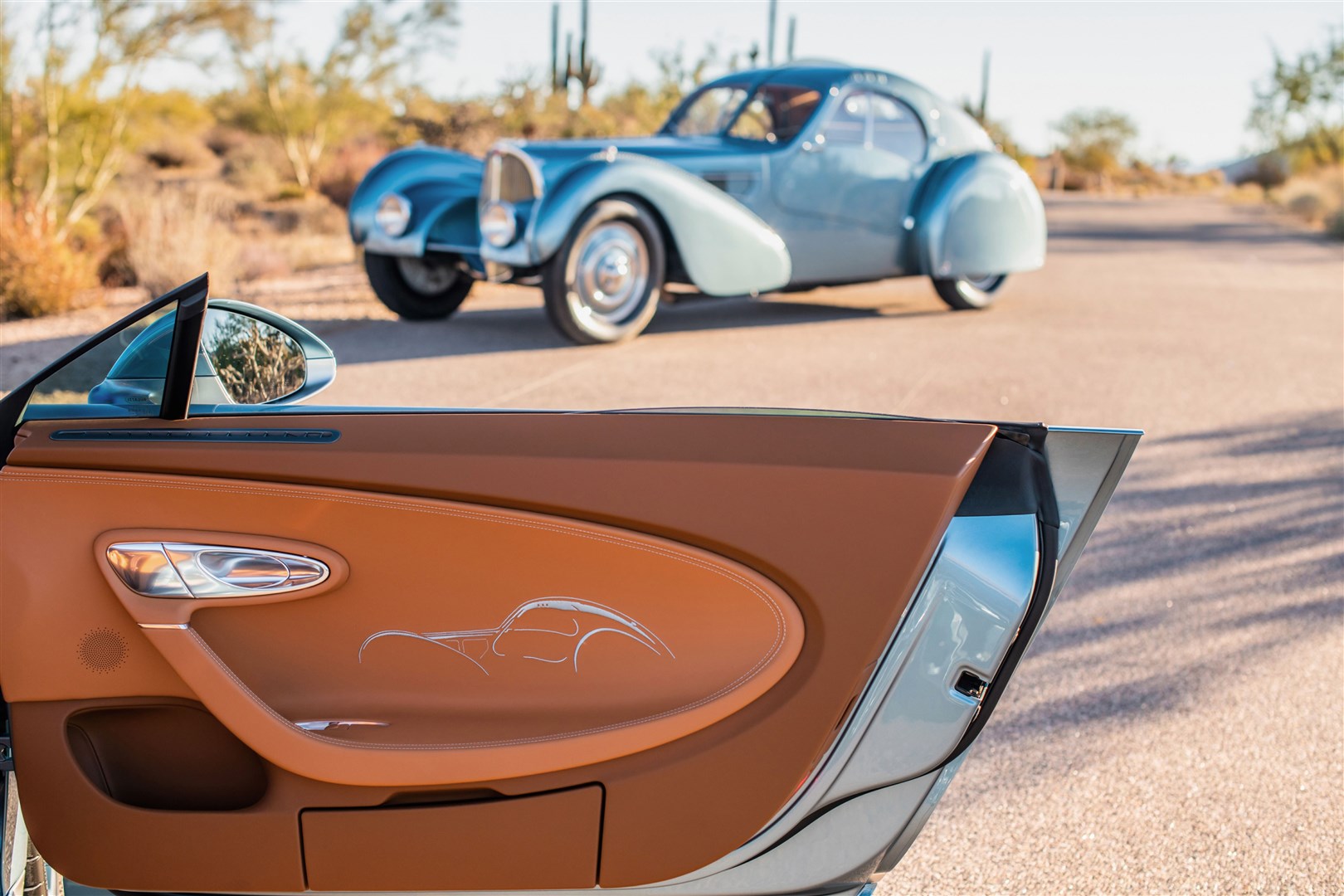 A range of styling details reference the classic Bugatti (PA)