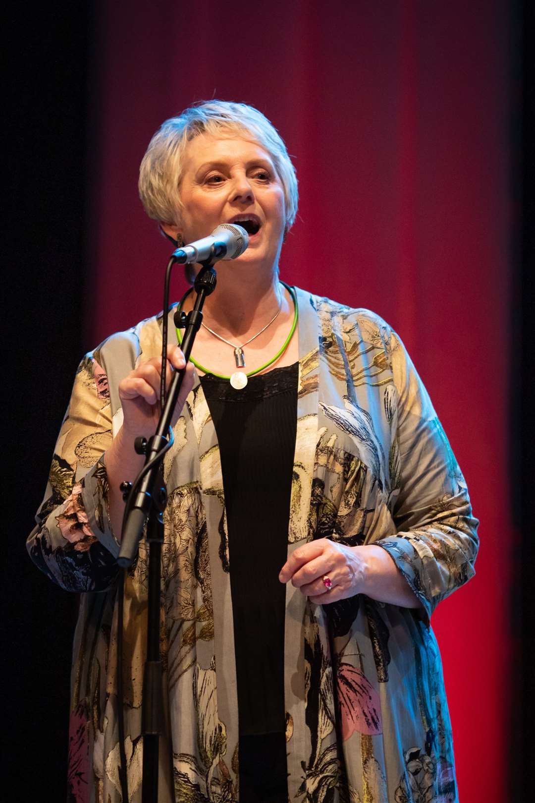 Special guest Gaelic singer, Margaret Stewart sings with Glenfinnan Ceilidh Band on stage at Eden Court Theatre on the openng night of live music, The Royal National Mòd 2021