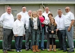 Winners of the Willie McDonald Memorial Triples at Thurso Bowling Club Joan Bridge, Andy Miller and Alan Pickthall are presented with the trophy by Willie’s daughter, Linda Sutherland. Also pictured are (back) losing semi-finalists Billy Swanney, Freda Sw