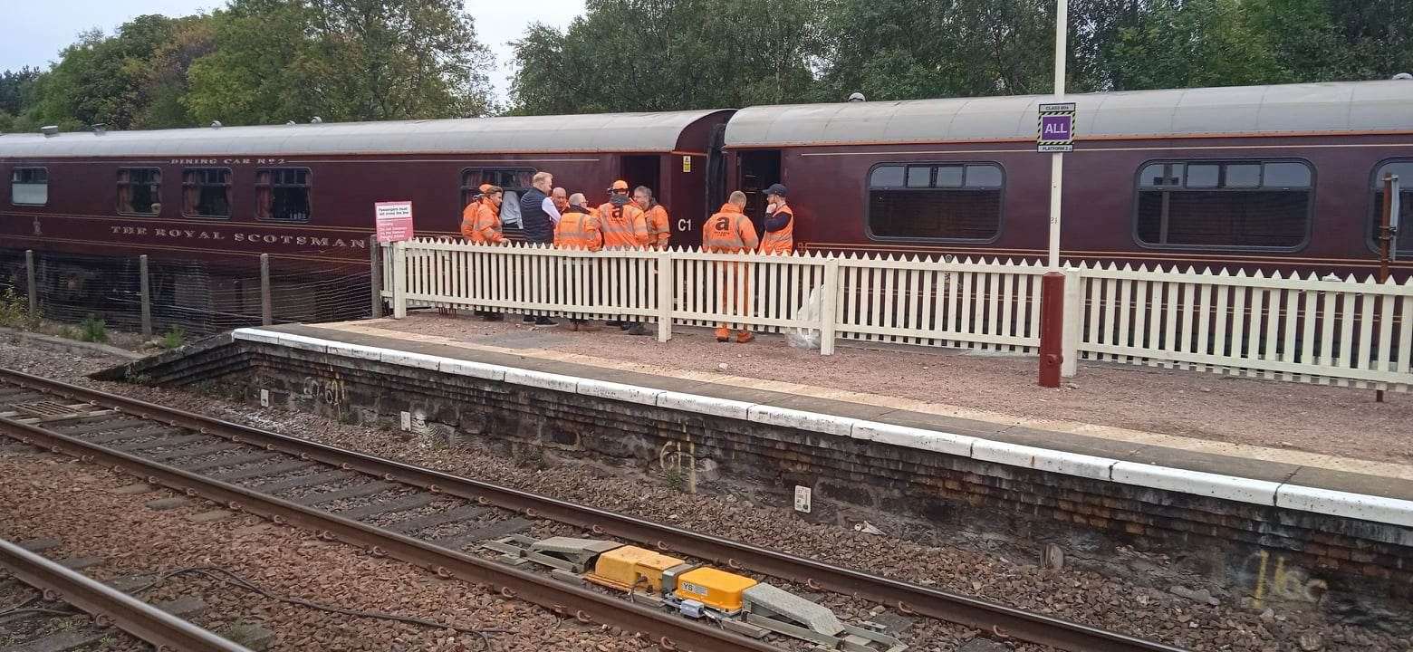 This afternoon: engineers wait to clear the Royal Scotsman carriages away to leave room for today's replacements