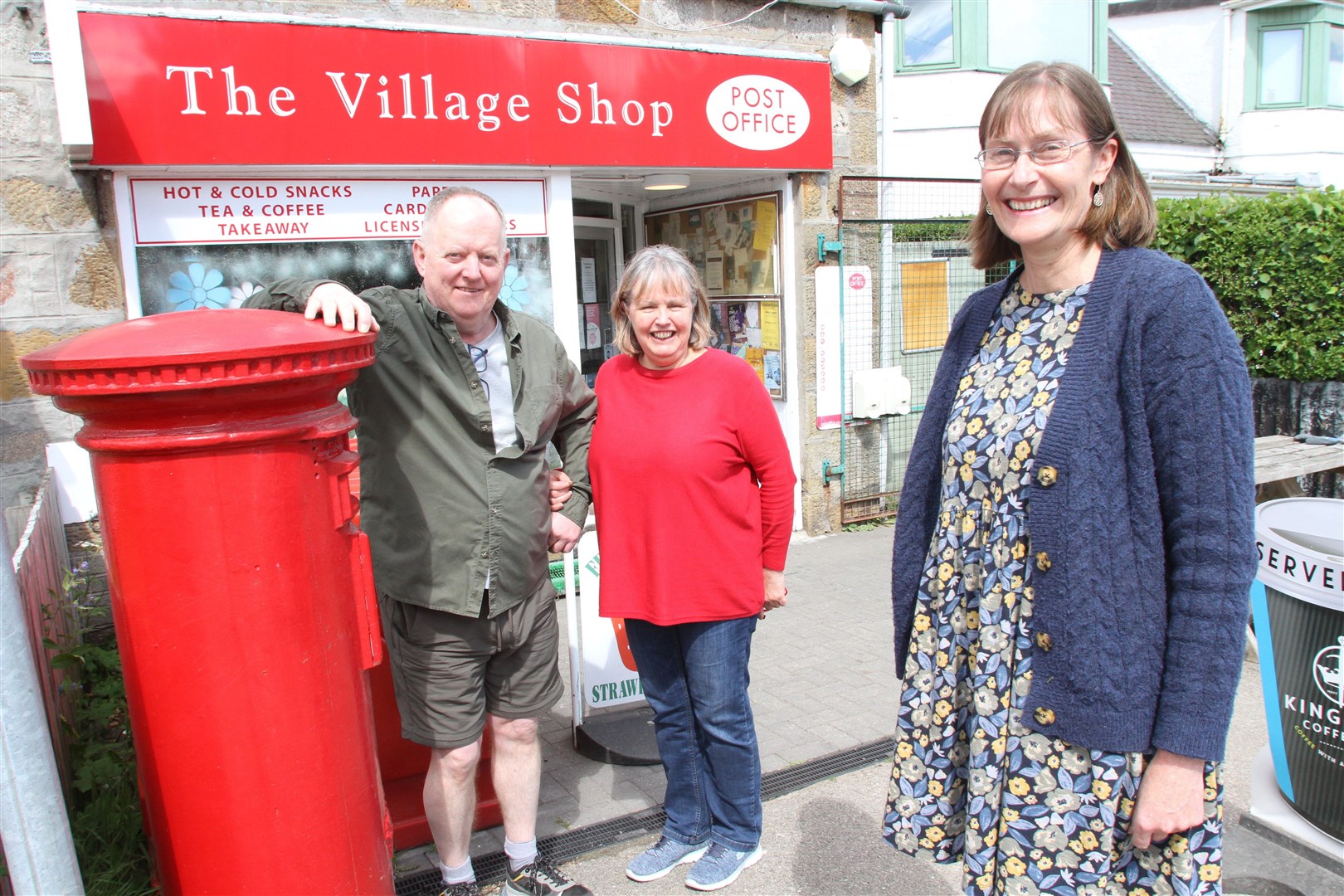 All change... shop and Post Office new owner Kim Dixon (right) with David and Beth Woolsey.