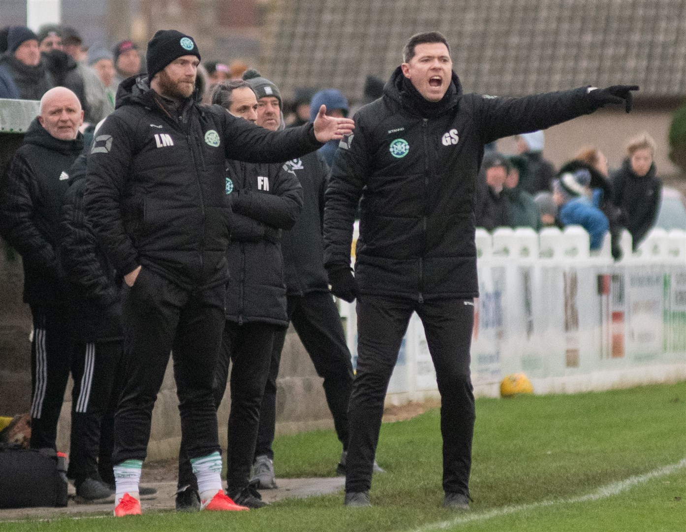 Buckie assistant manager Lewis MacKinnon and manager Graeme Stewart...Buckie Thistle FC (3) vs Deveronvale FC (2) - Highland Football League 22/23 - Victoria Park, Buckie 03/01/2023...Picture: Daniel Forsyth..