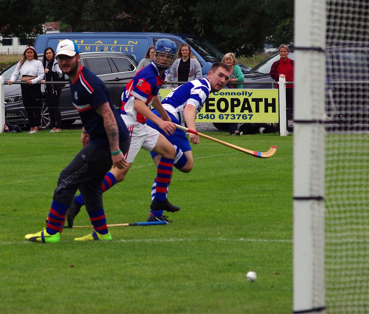 Newtonmore's Mike Russell nets his second of the day (Photo: Dave Fallows)