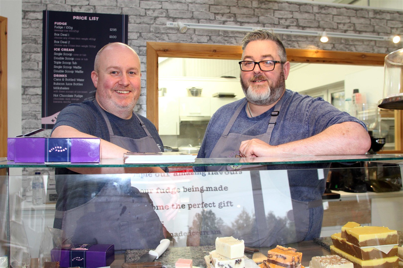 Chris Lewis and Stephen Bruce behind the counter at Kilted Fudge on Dalfaber Industrial Estate.