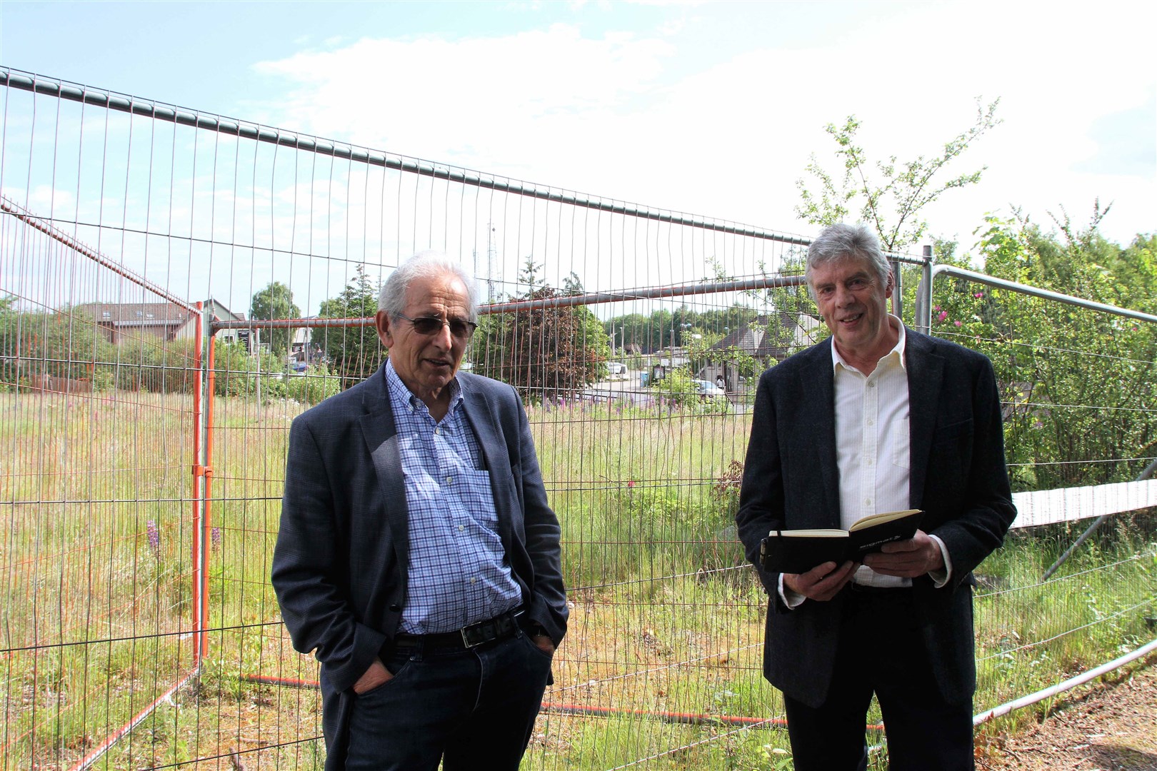 Upland Development Ltd owner David Cameron with Norr architect Greg Duncan at the site last summer.