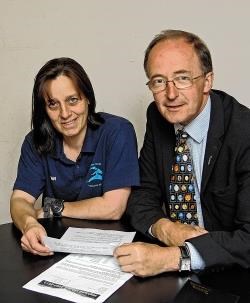 Tongue and Farr Sports Association company secretary Jim A. Johnston and North Coast Leisure Centre manager Jean Jack with the letter informing them of the award from Leader