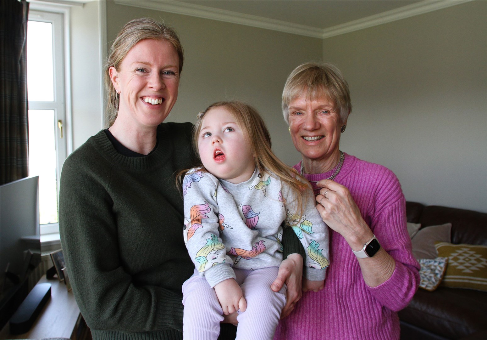 ALL FOR EVELYN: “We are so grateful for CHAS and all they do to support our family,” said Grace (left) with Evelyn and Fiona Hunter (right).