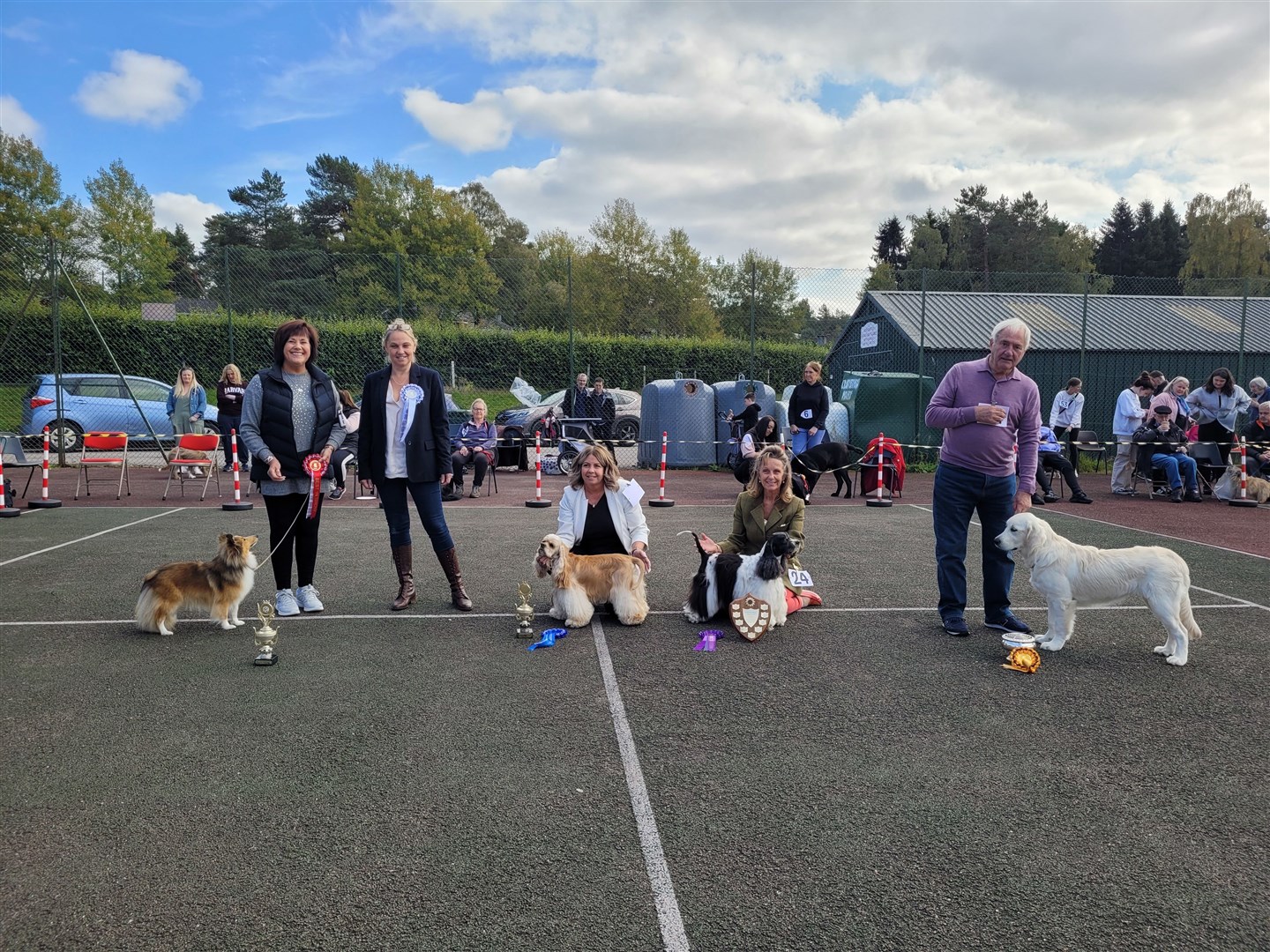 THE WINNERS ARE: From left, best in show Karen Law with ‘Robyn’, a Shetland sheepdog; judge Juliette Burnside; reserve best Aileen Toynton with ‘Tara’, an American cocker spaniel; best veteran ‘Toto’, an American cocker spaniel also owned by Aileen (handled here by a friend); and best puppy Sula, a golden retriever, with owner Gordon Mackenzie.